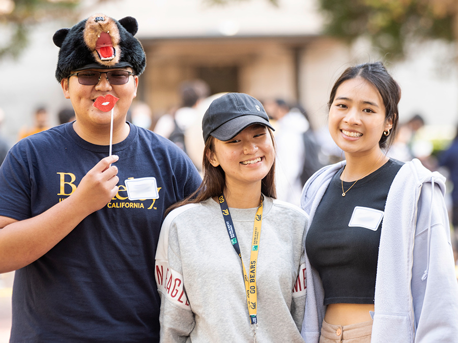 photo of three students smiling at the 2021 bioengineering picnic