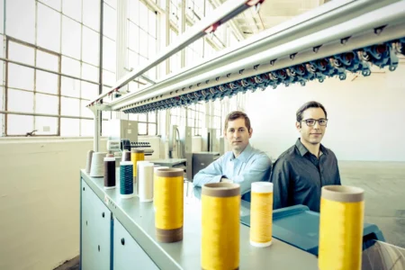 Photo of Bolt Threads cofounders Dan Widmaier (left) and David Breslauer in their manufacturing facility