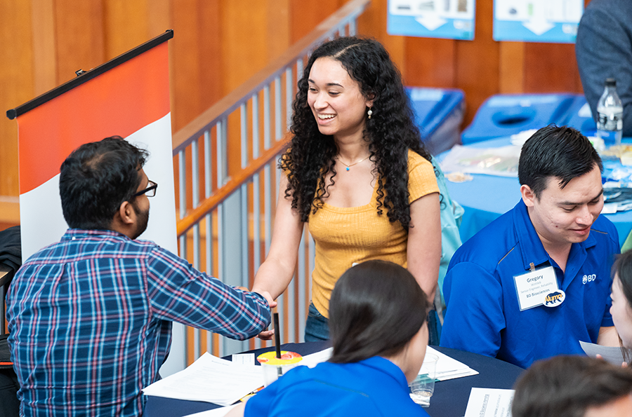 photo of company reps talking to students at BioTech Connect 2020