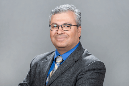 head and shoulders photo of Sen