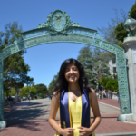 photo of student in front of Sather Gate