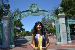 photo of student in front of Sather Gate