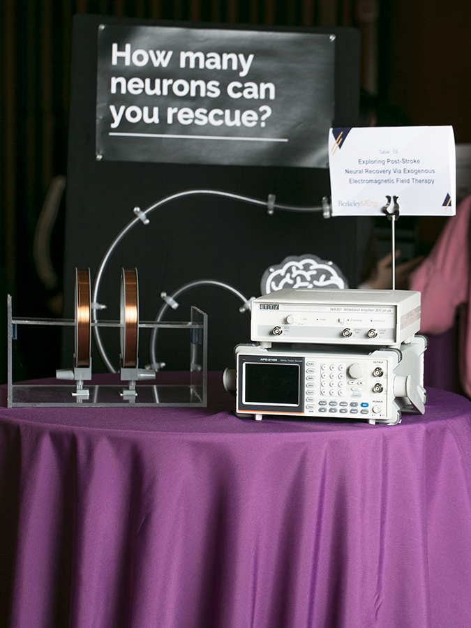 photo of project prototype on a table with a sign saying How many neurons can you rescue?