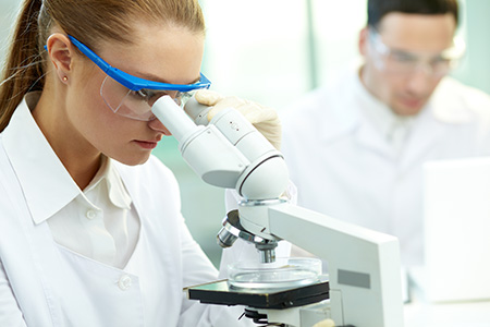 woman at microscope